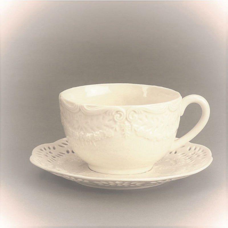 Cream colored Victorian cup &amp; saucer