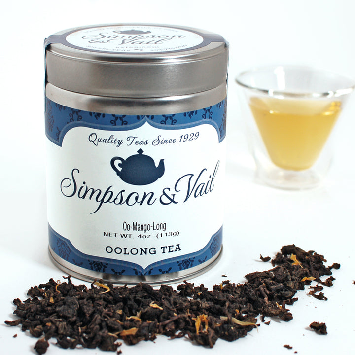 Oo-Mango-Long Tin w/ loose tea and brewed cup