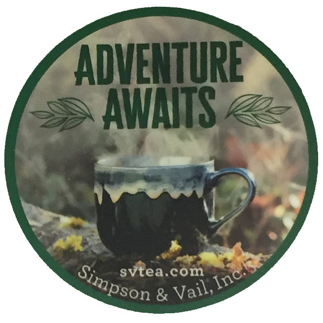 Magnet that says Adventure Awaits