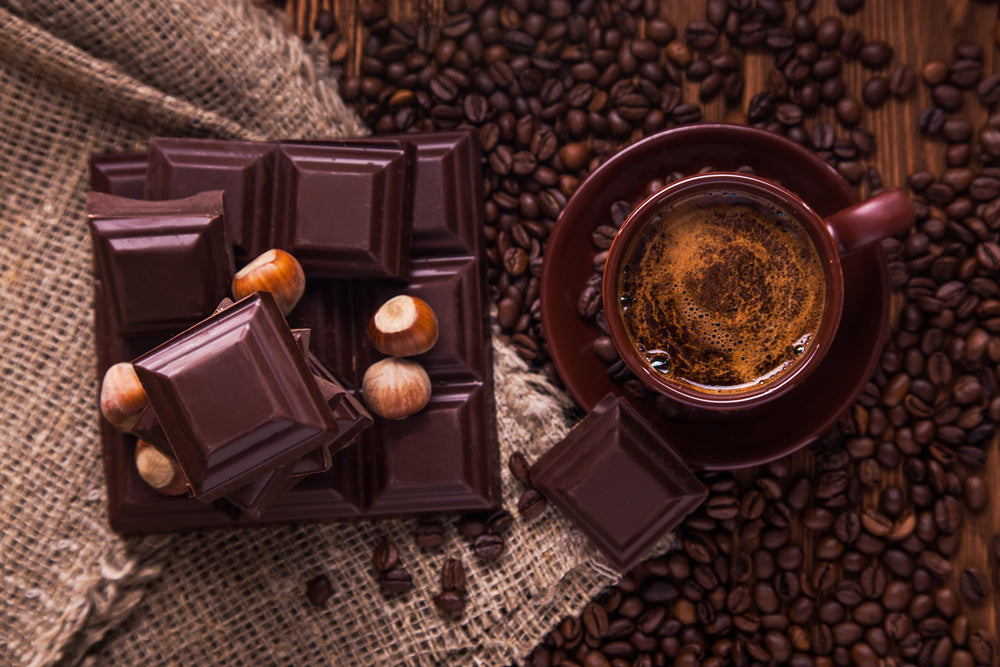 Moose Tracks Coffee Beans w/ brewed cup and chocolate 