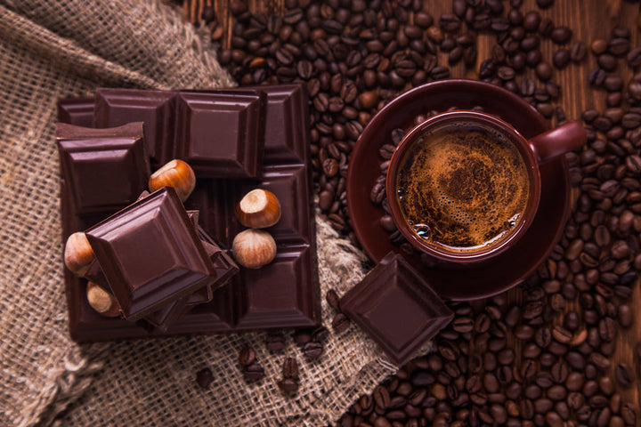 Moose Tracks Coffee Beans w/ brewed cup and chocolate 